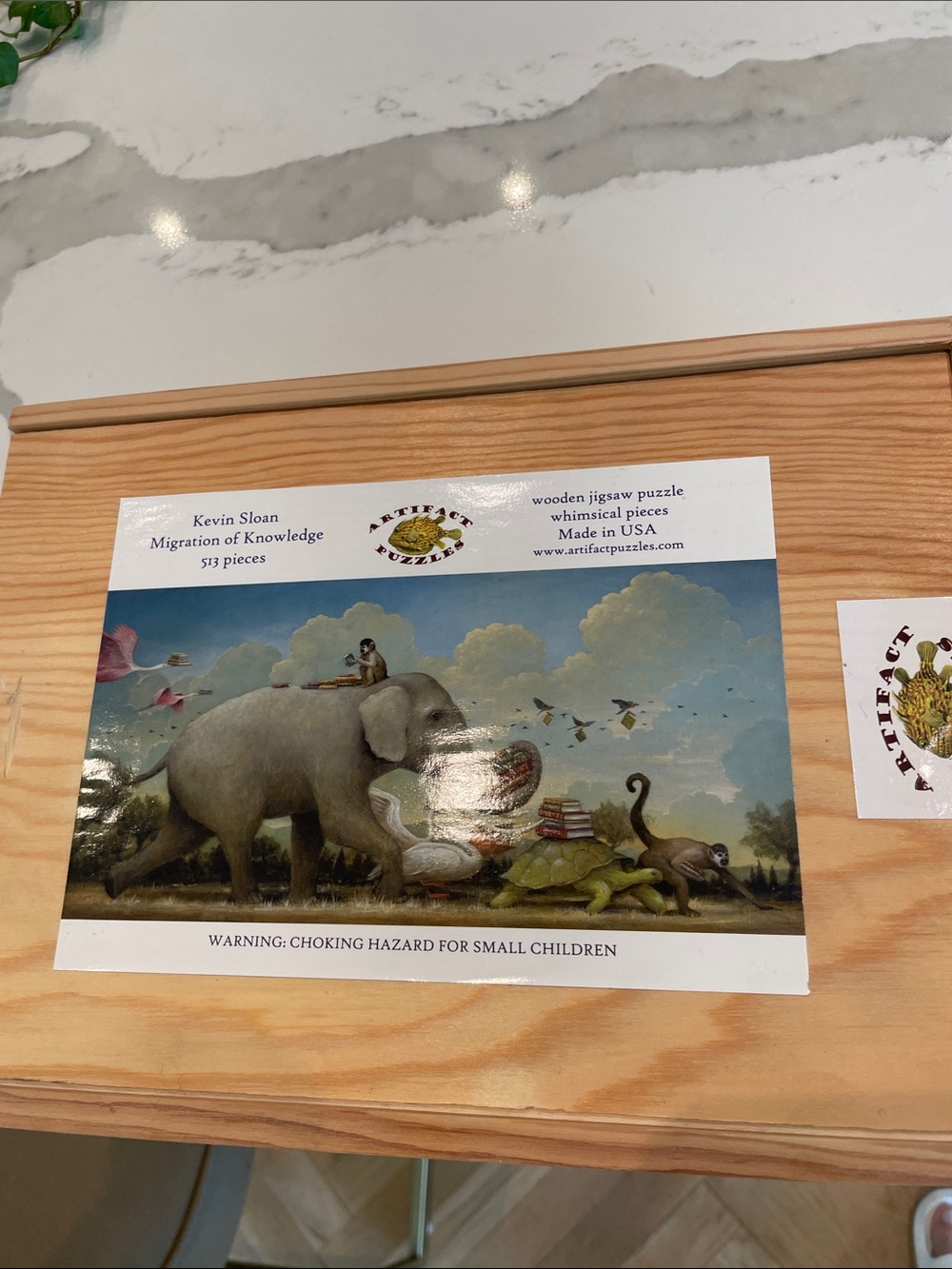 Artifact jigsaw puzzle. Kevin Sloan migration of knowledge.